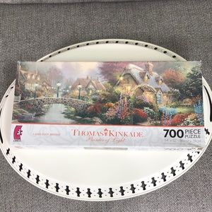 Thomas Kinkade Painter of Light Lamplight Bridge 700-piece puzzle box not opened